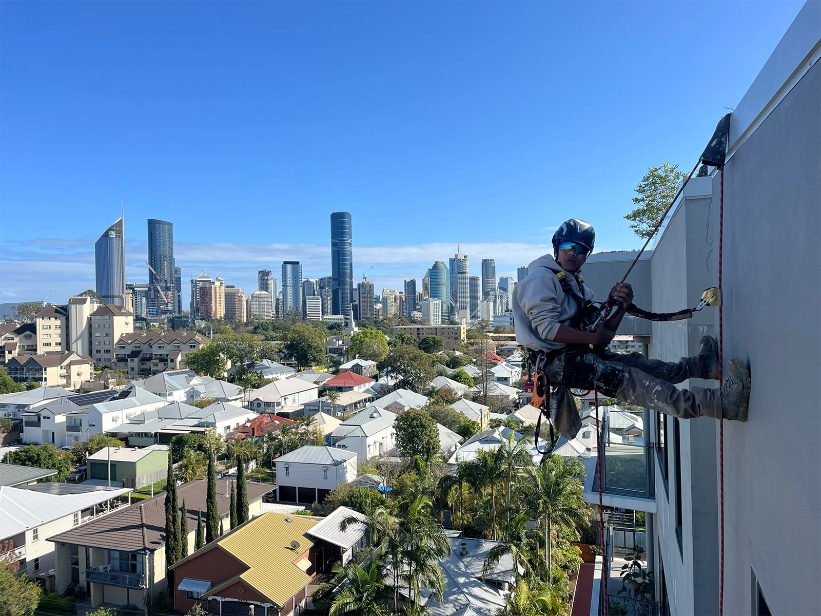 Commercial building being repainted in Brisbane while the business keeps trading
