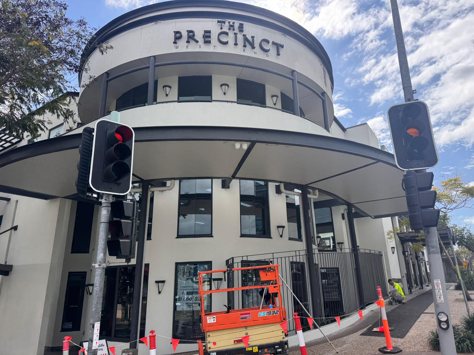 Commercial painter showing licence, insurance and safety documents to a client in Brisbane